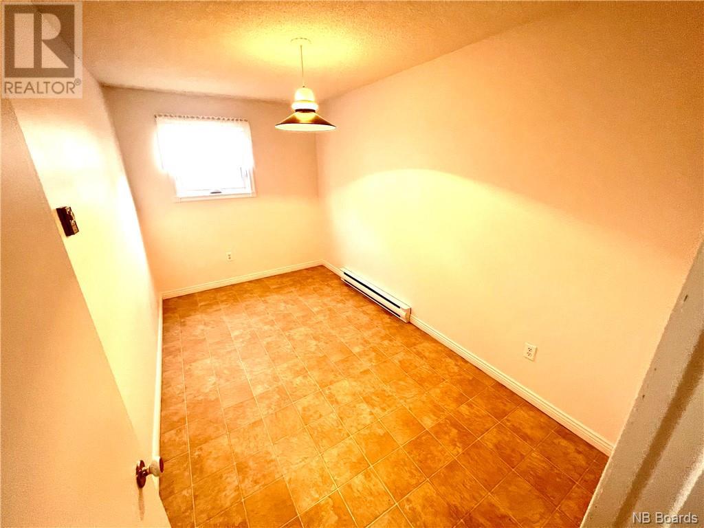 61 Rue Du Ruisseau, Lamèque, New Brunswick  E8T 1M2 - Photo 22 - NB093592
