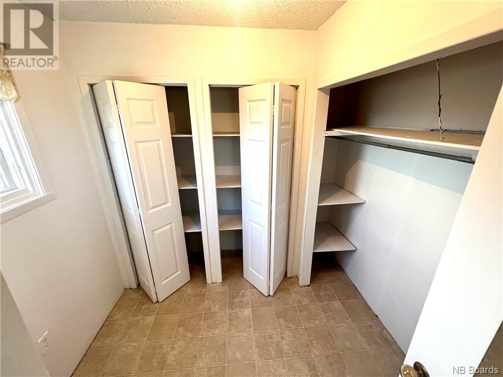 61 Rue Du Ruisseau, Lamèque, New Brunswick  E8T 1M2 - Photo 25 - NB093592
