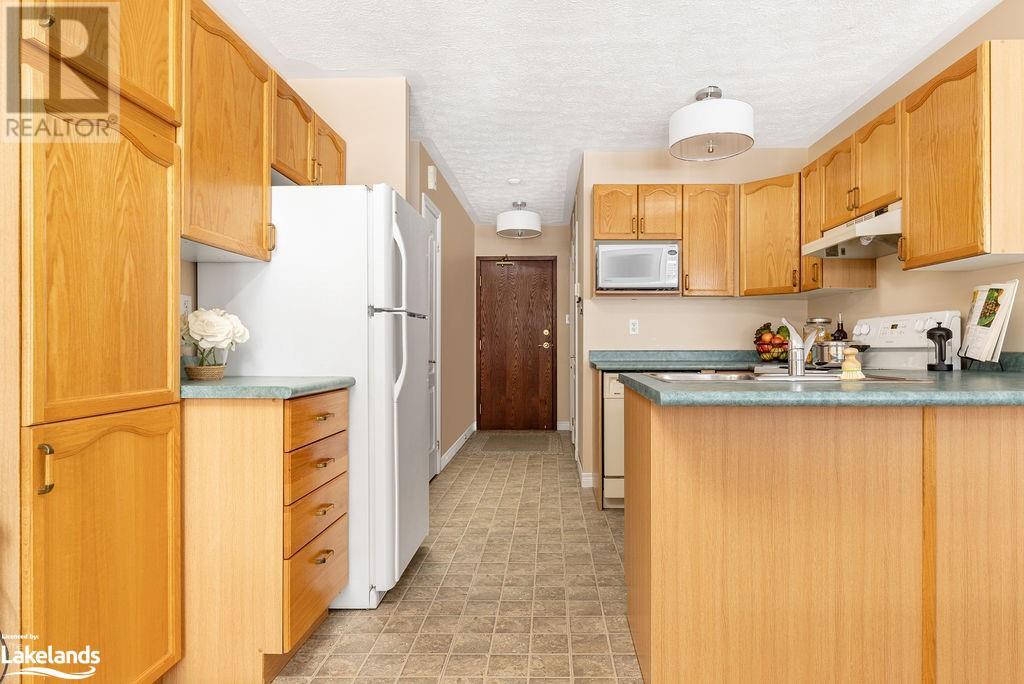 35 Dairy Lane Unit# 206, Huntsville, Ontario  P1H 2L8 - Photo 5 - 40539831
