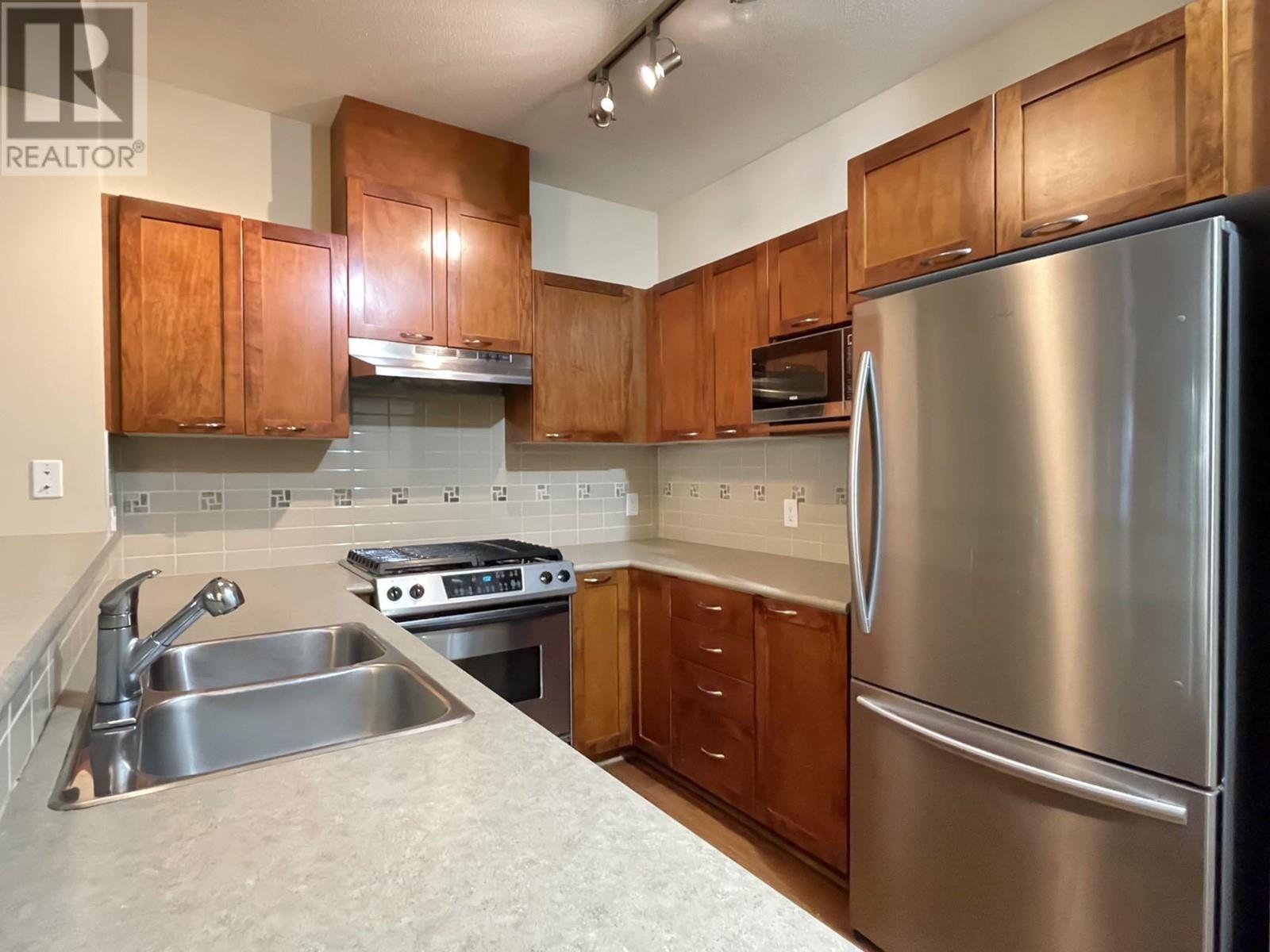 105 2969 Whisper Way, Coquitlam, British Columbia  V3E 3S8 - Photo 2 - R2850487