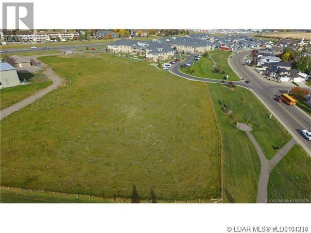 2721 Fairway Road S, Lethbridge, Alberta  T1K 7A5 - Photo 1 - LD0164214