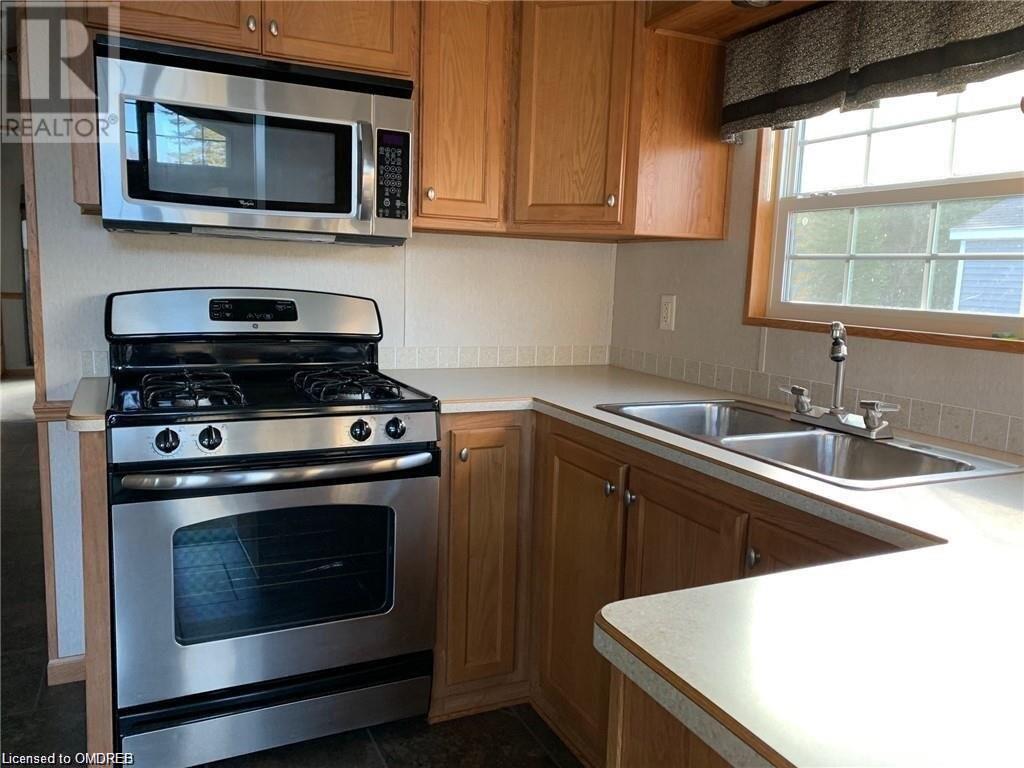 7489 Sideroad 5 E Unit# Tamarak 113, Mount Forest, Ontario  N0G 2L0 - Photo 19 - 40526002