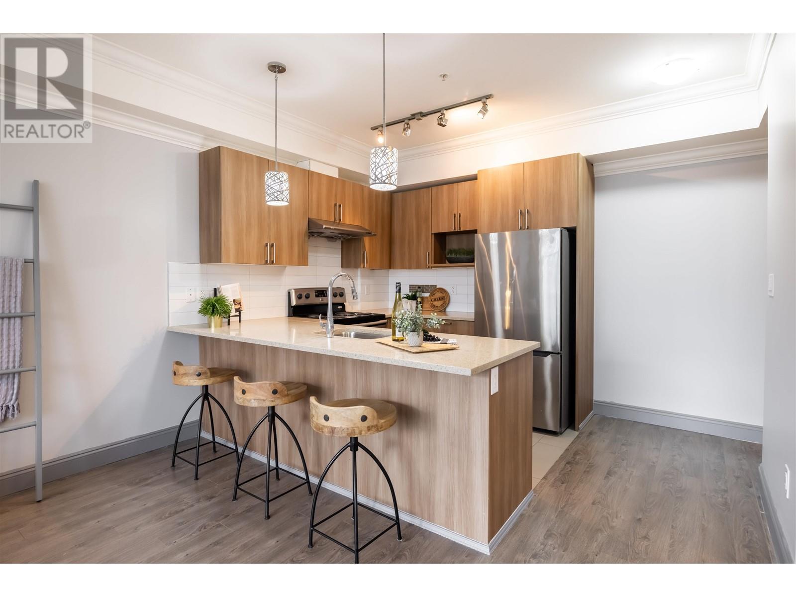 205 11566 224 Street, Maple Ridge, British Columbia  V2X 9C9 - Photo 1 - R2856538