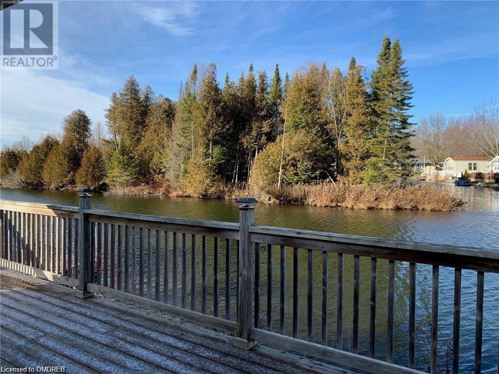 7489 Sideroad 5 E Unit# Tamarak 113, Mount Forest, Ontario  N0G 2L0 - Photo 2 - 40526002