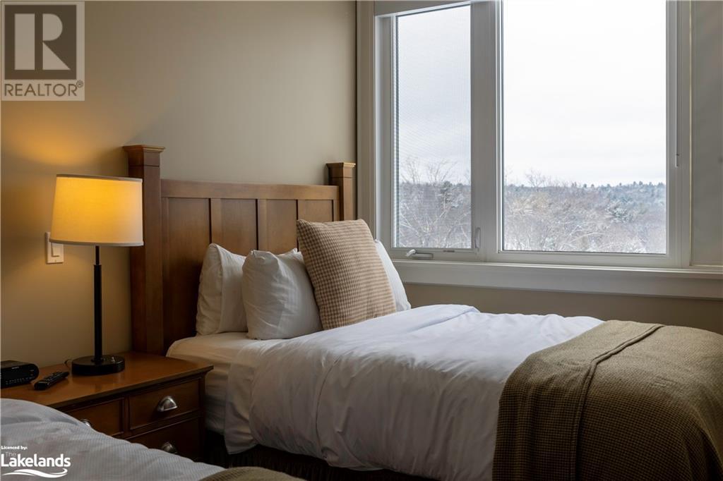 1869 Muskoka Road 118 W Unit# T202-D1, Muskoka Lakes, Ontario  P1L 1W8 - Photo 2 - 40559941