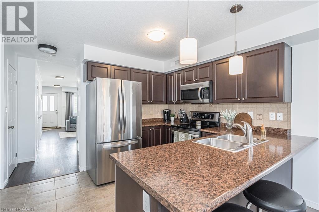 35 Mountford Drive Unit# 57, Guelph, Ontario  N1E 0G6 - Photo 4 - 40561895
