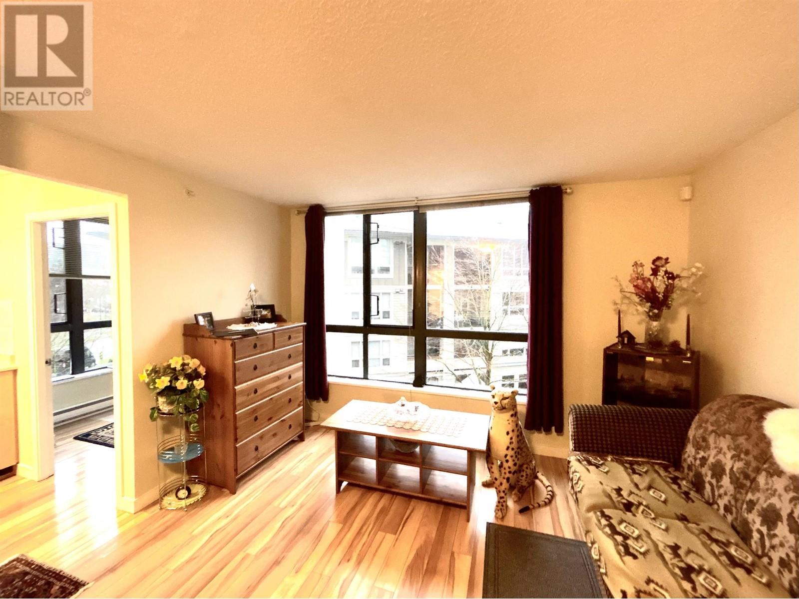 305 3588 Crowley Drive, Vancouver, British Columbia  V5R 6H3 - Photo 1 - R2864630