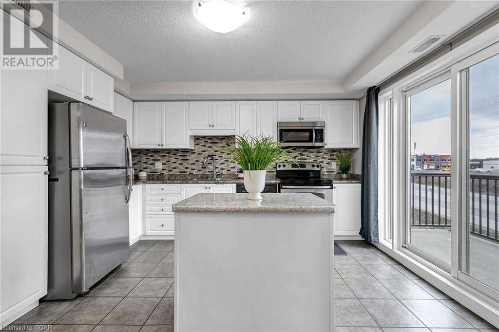 1654 Fischer Hallman Road Unit# 2e, Kitchener, Ontario  N2R 0C6 - Photo 4 - 40567170