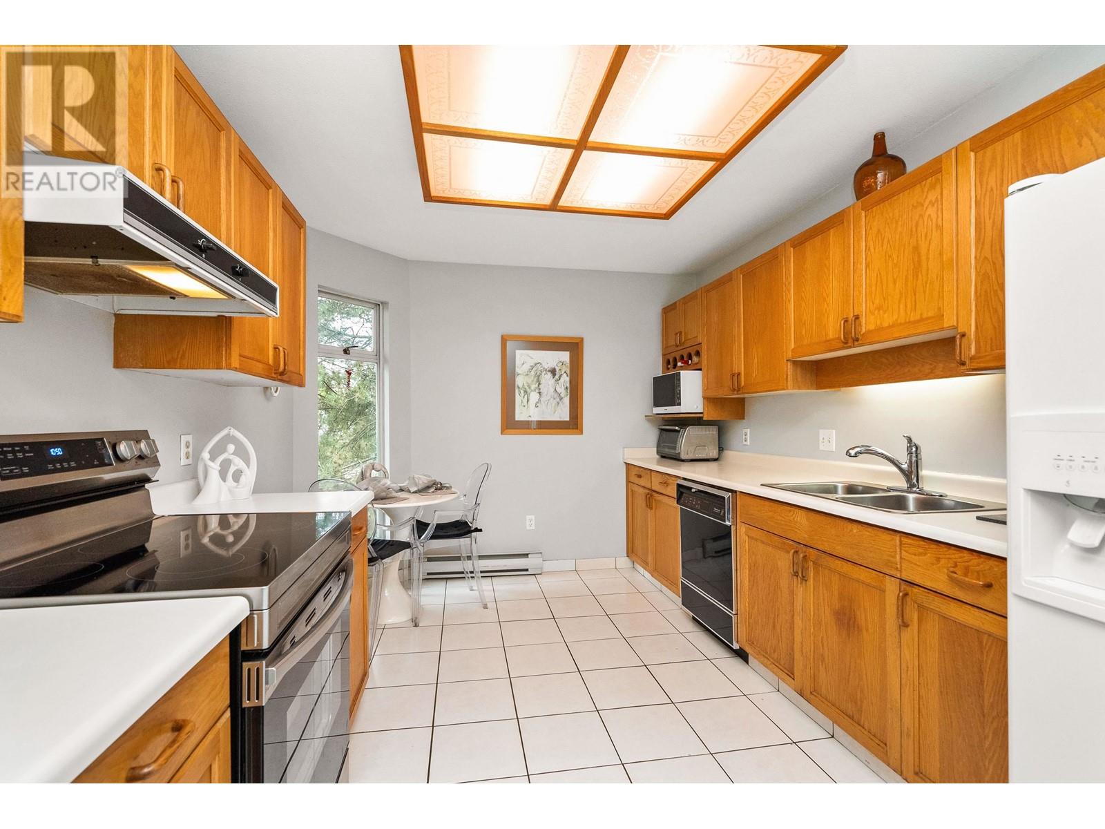 403 2733 Atlin Place, Coquitlam, British Columbia  V3C 5B1 - Photo 5 - R2866834