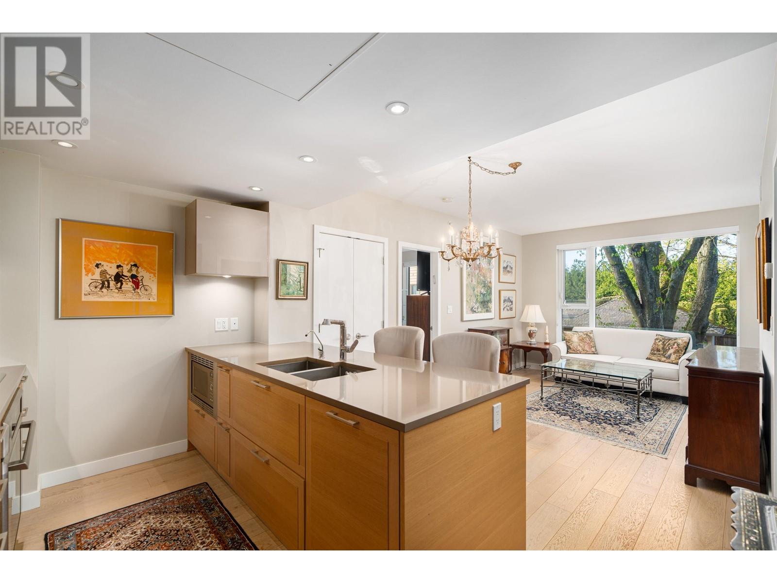 203 1515 Atlas Lane, Vancouver, British Columbia  V6P 0C9 - Photo 1 - R2868254