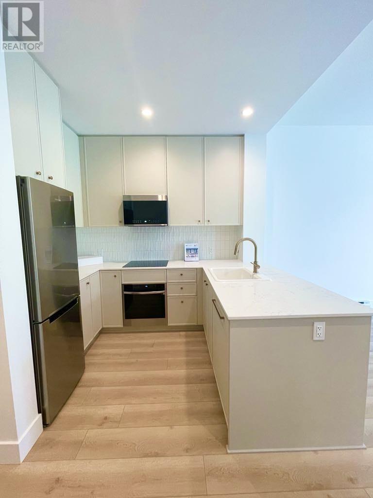 211 718 Edgar Avenue, Coquitlam, British Columbia  V3K 0H2 - Photo 6 - R2868561