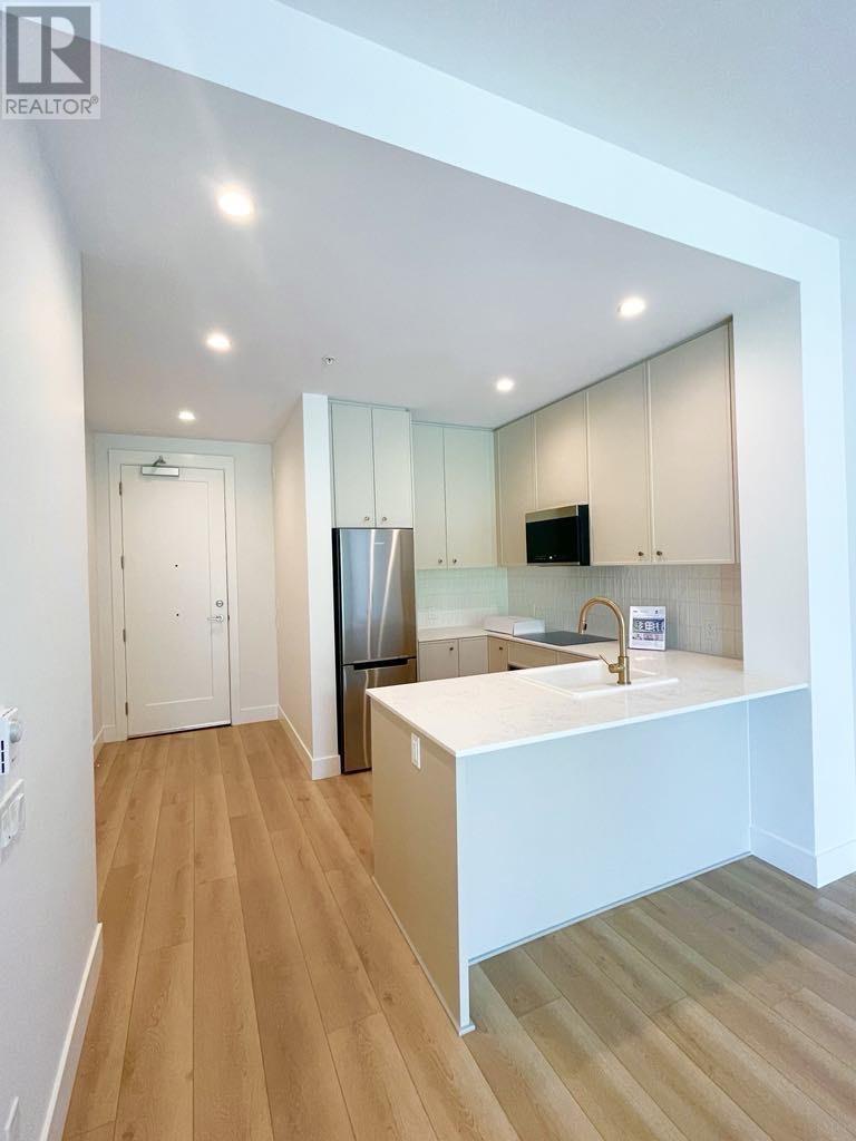 211 718 Edgar Avenue, Coquitlam, British Columbia  V3K 0H2 - Photo 5 - R2868561