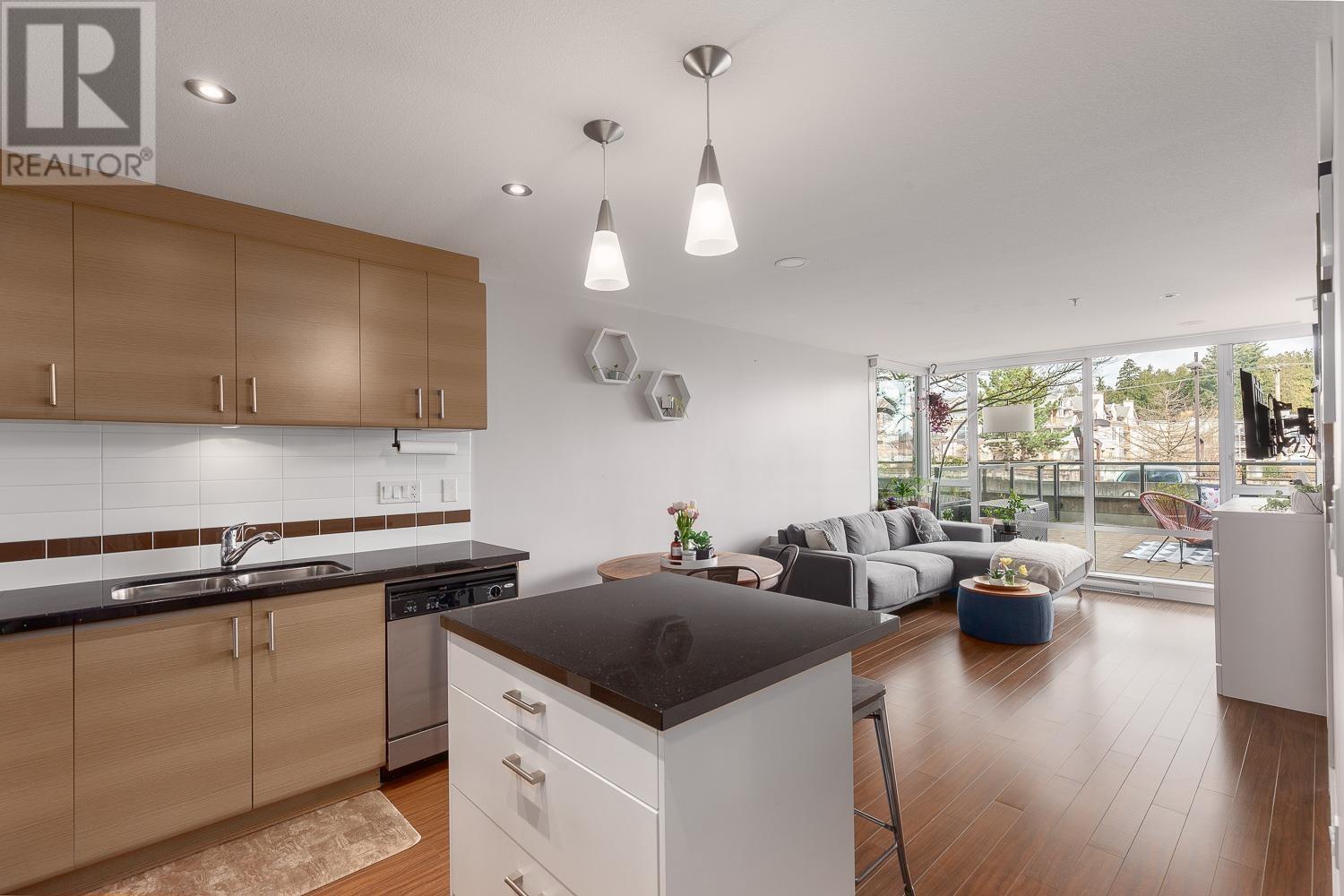 204 12079 Harris Road, Pitt Meadows, British Columbia  V3Y 0C7 - Photo 1 - R2868726