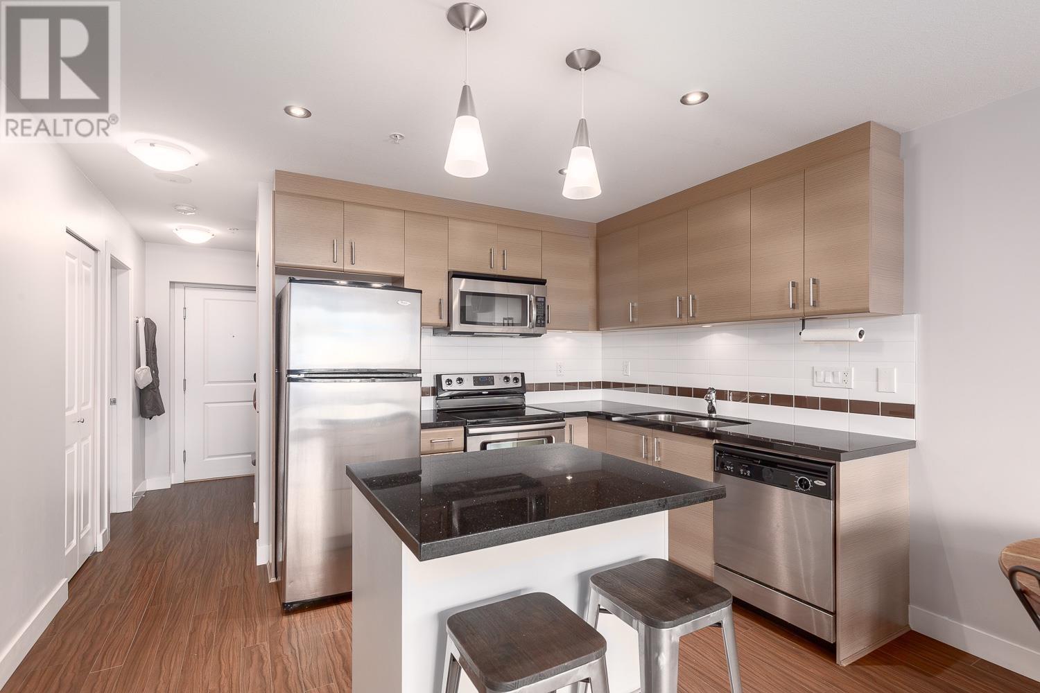 204 12079 Harris Road, Pitt Meadows, British Columbia  V3Y 0C7 - Photo 4 - R2868726