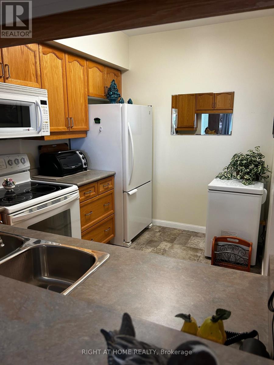 #202 -94 Dean Ave, Barrie, Ontario  L4N 0M3 - Photo 22 - S8221892