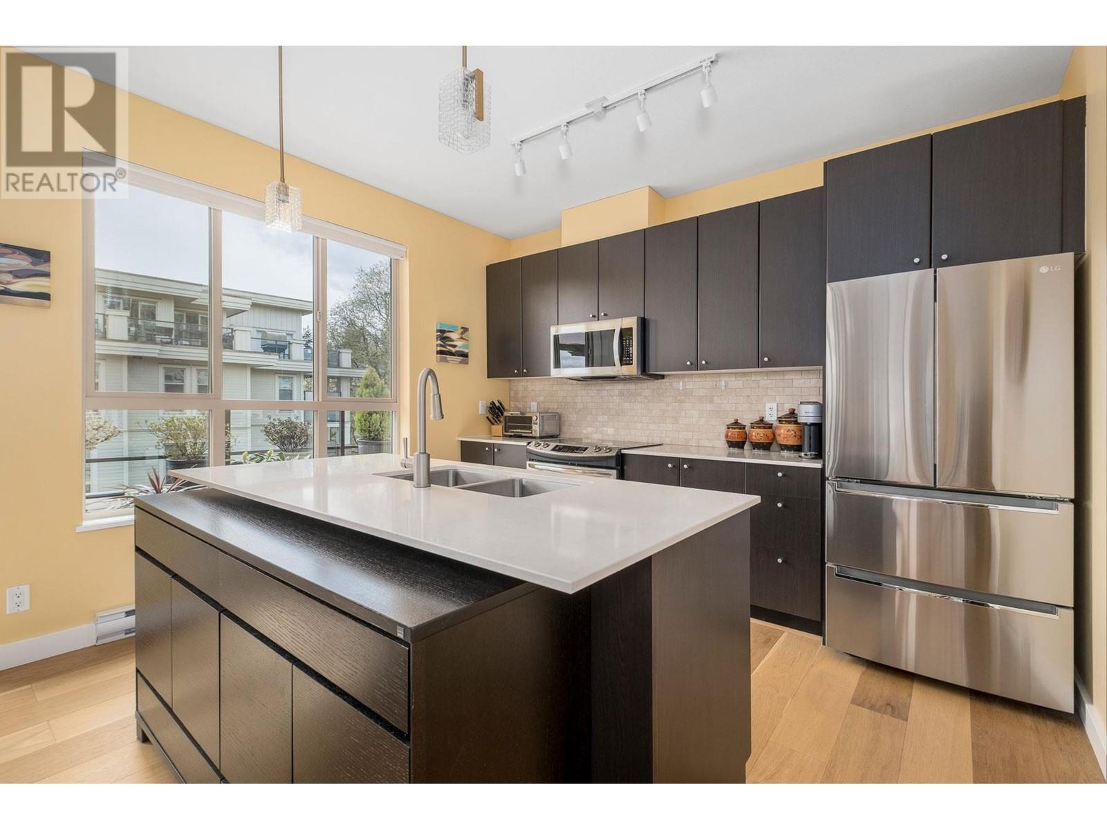 403 250 Francis Way, New Westminster, British Columbia  V3L 0E6 - Photo 11 - R2869207