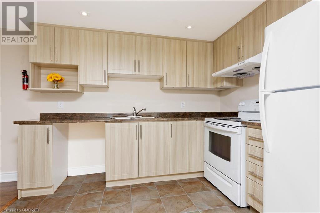 355 Mccartney Crescent Unit# Bsmt, Milton, Ontario  L9T 0B3 - Photo 9 - 40570129