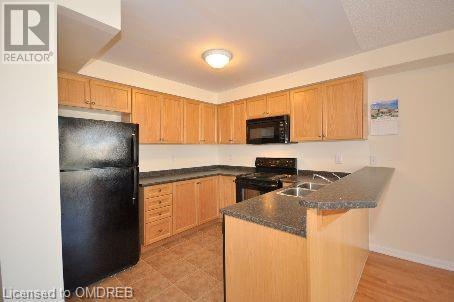 620 Ferguson Drive Unit# 8, Milton, Ontario  L9T 8M6 - Photo 3 - 40570875