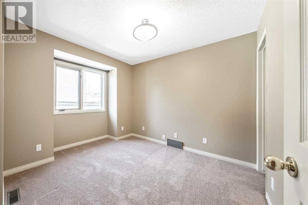 105 Candle Place Sw, Calgary, Alberta  T2W 5R7 - Photo 16 - A2122626