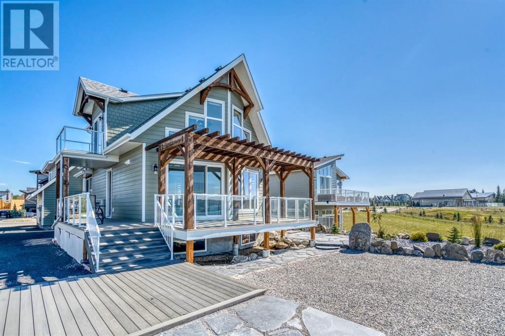 447 Cottage Club Cove, Rural Rocky View County, Alberta  T4C 1B1 - Photo 19 - A2124419