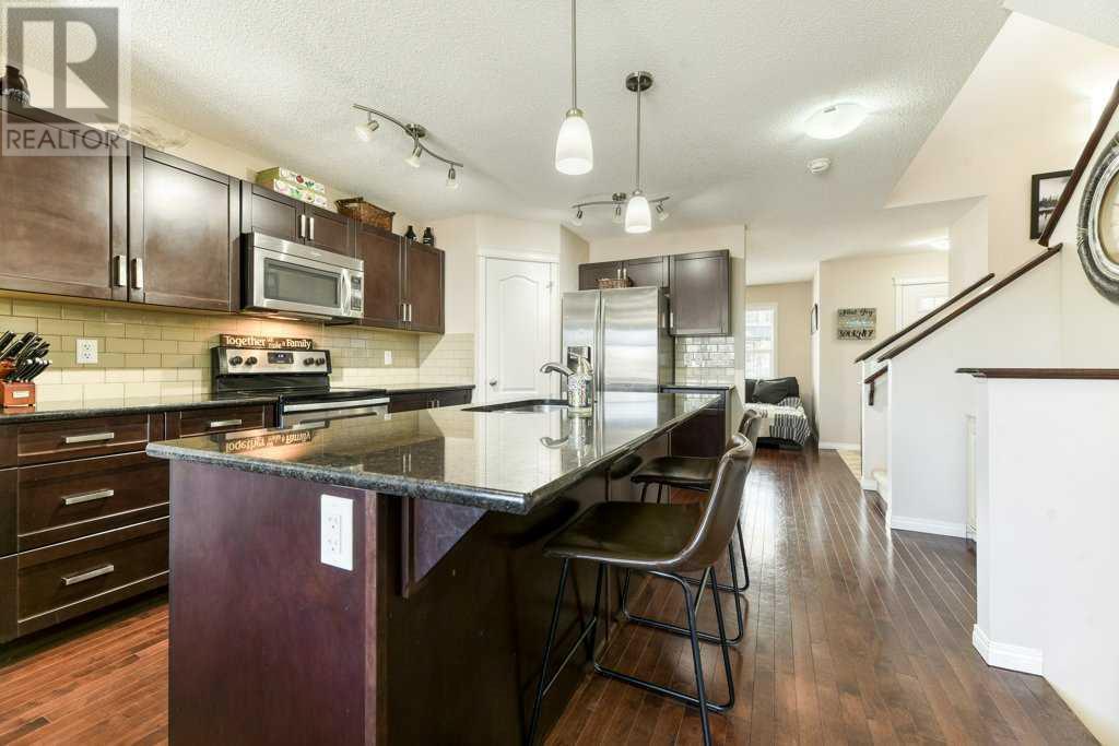 1264 Reunion Place Nw, Airdrie, Alberta  T4B 0M4 - Photo 3 - A2126210