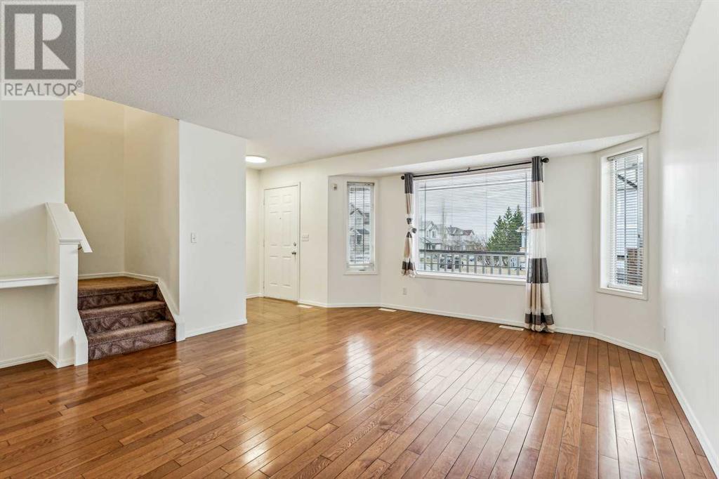 18 Arbour Crest Circle Nw, Calgary, Alberta  T3G 4A3 - Photo 6 - A2126883