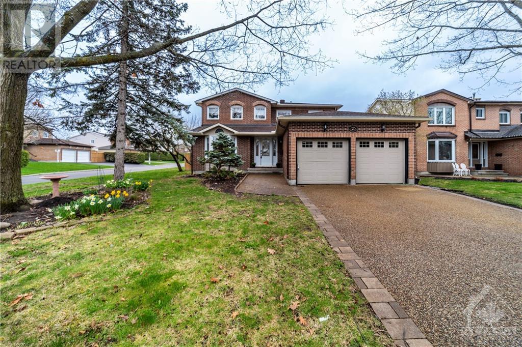 Completely renovated from top to bottom! You won't want to miss out on this stunning family home situated on a corner lot on a quiet street in Orleans Wood. Enjoy the premium location of this home next to the Ottawa River, a beautiful walking path along the river, parks, schools, quick access to the 417, and close to Place D'Orleans Shopping Centre. Gleaming wide plank hardwood flooring welcomes you to this magnificent home. Main floor living room features a pocket door for you to use the space as an office if you choose. Open concept great room comes complete with a dining room and a large gourmet eat-in kitchen with granite counters, plenty of cupboard space, and an oversized island with views into the family room with a cozy wood fireplace. A curved staircase brings you upstairs with 4 good-sized bedrooms including a primary suite with hardwood flooring, WIC, and a fully renovated stunning ensuite with a glass stand-alone shower. Added living space in the fully finished basement. (id:48254)