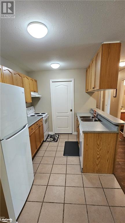31 Dairy Lane Unit# 105, Huntsville, Ontario  P1H 2L7 - Photo 13 - 40583582
