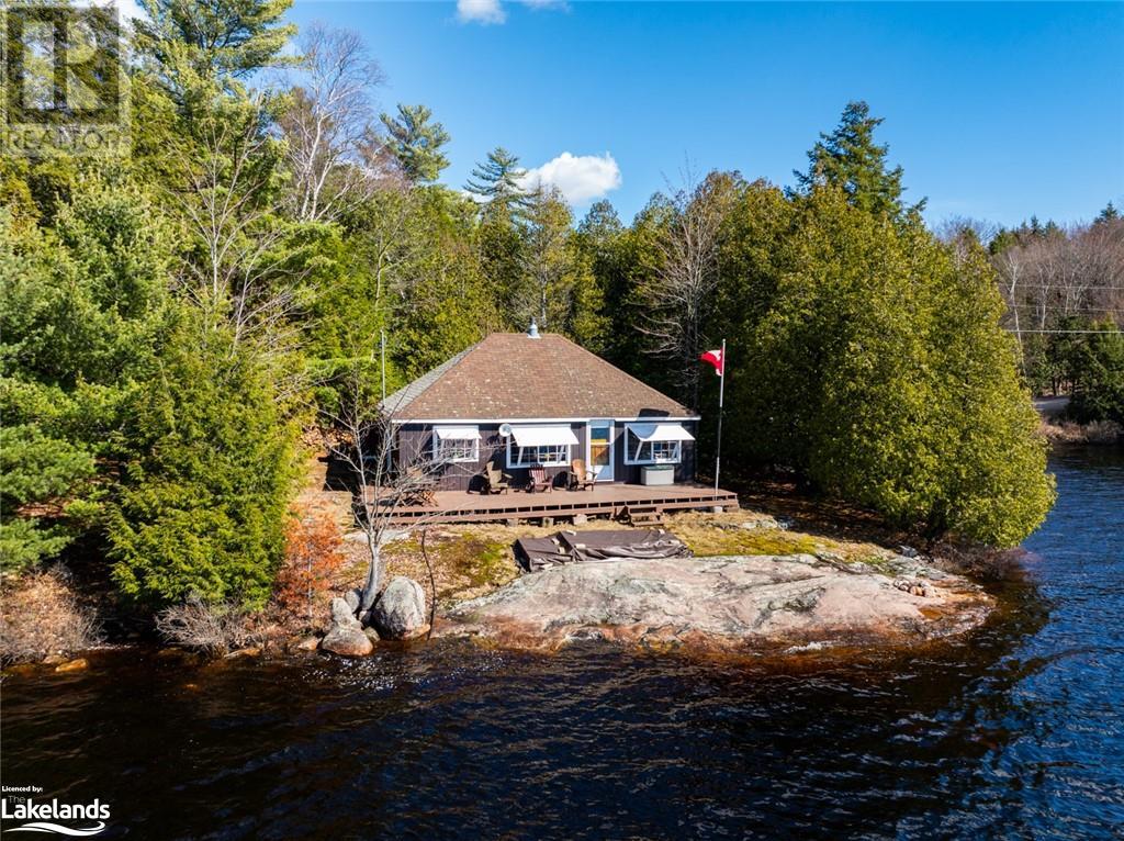 764 East Bear Lake Road, Sprucedale, Ontario P0A 1Y0 (27059210) Bay Homes For Sale