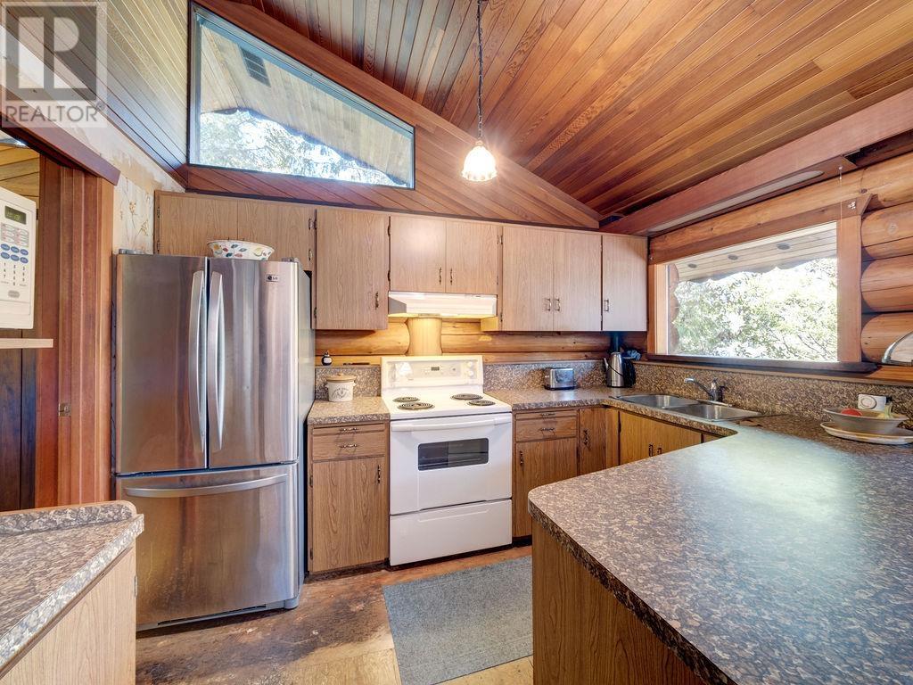 9862 Wescan Road, Halfmoon Bay, British Columbia  V7Z 1G2 - Photo 11 - R2911768