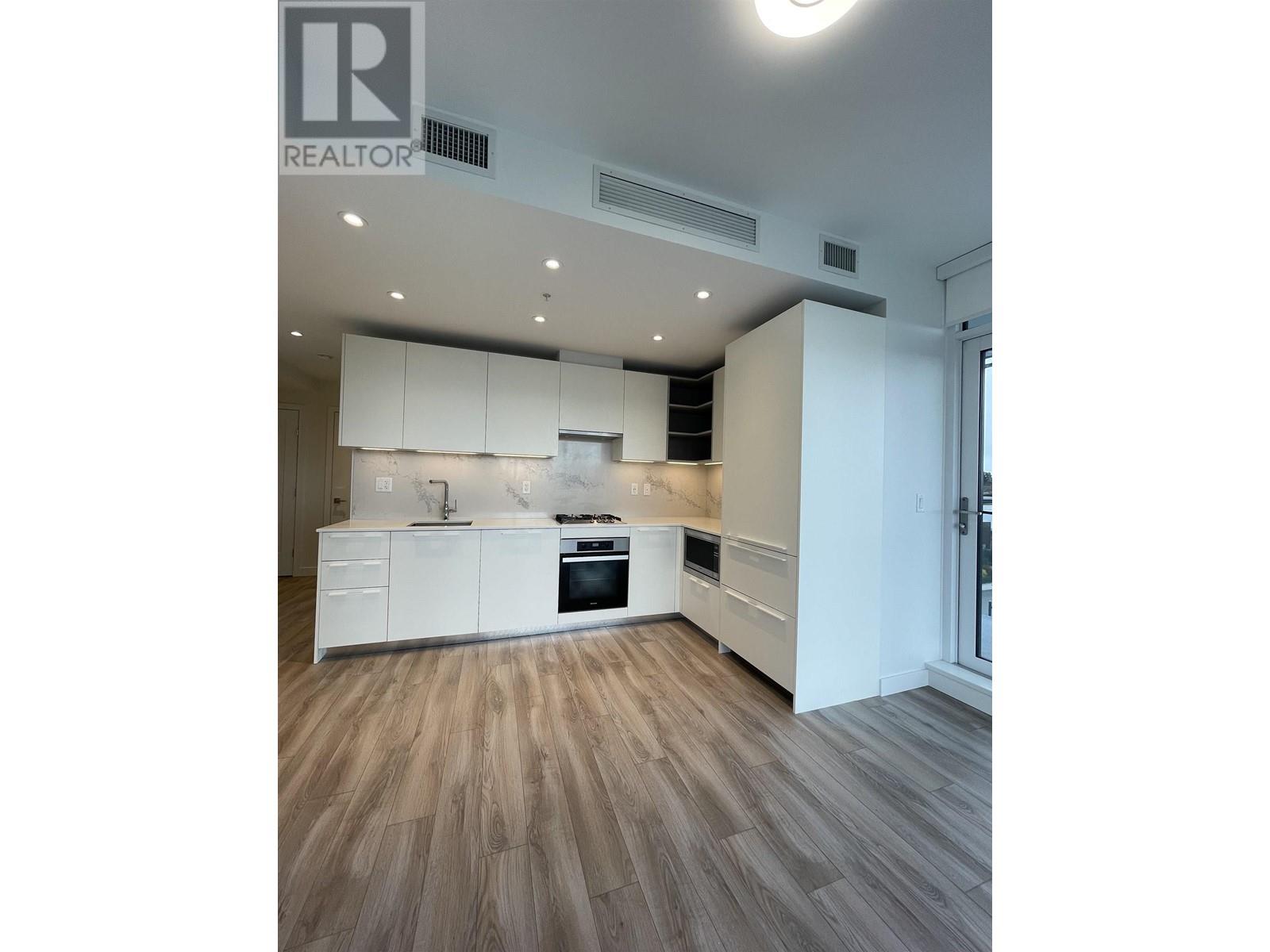 Property at 407 6699 DUNBLANE AVENUE image 4