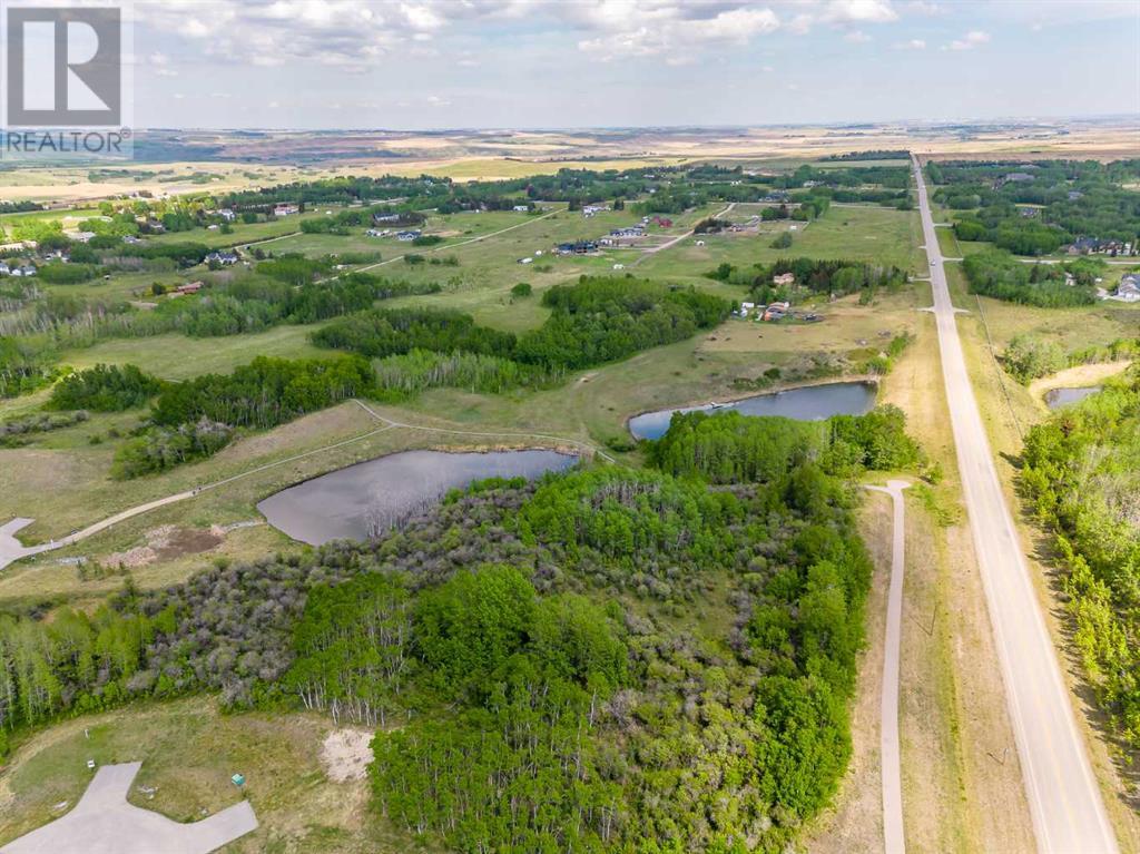 113 Silverhorn Ridge, Rural Rocky View County, Alberta  T3R 0X3 - Photo 30 - A2132069