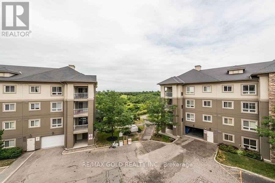 408 - 4 Dayspring Circle N, Brampton (Goreway Drive Corridor), Ontario  L6P 2Z5 - Photo 3 - W9283940