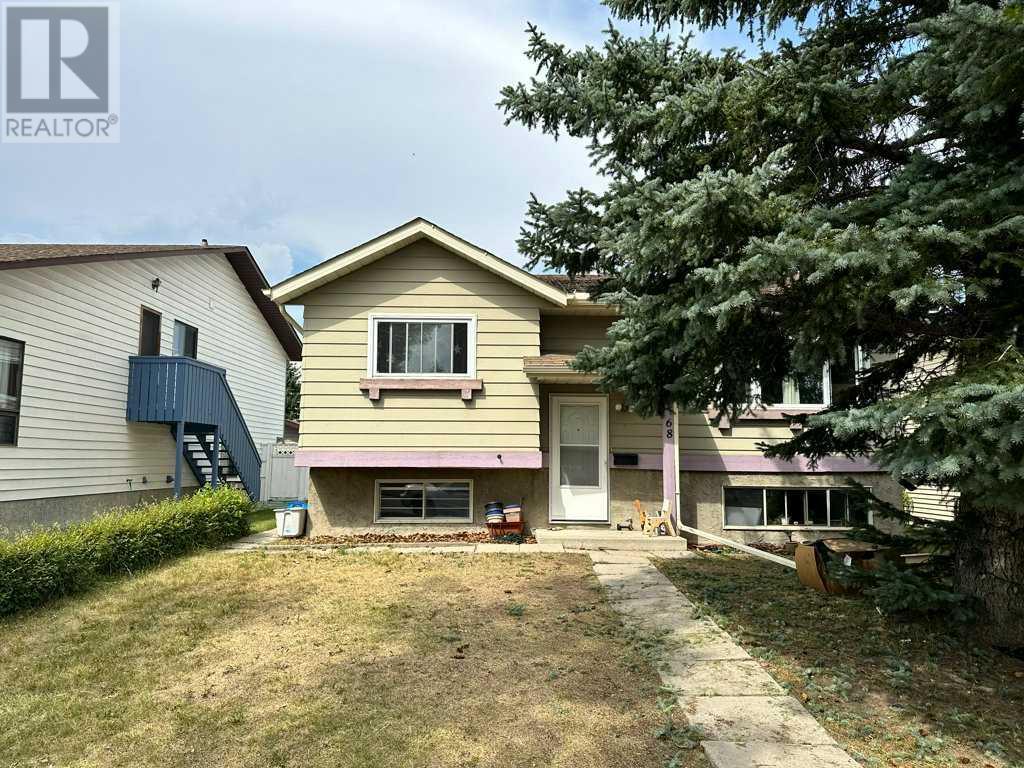 68 Macewan Drive Nw, Calgary, Alberta  T3K 2P7 - Photo 1 - A2162323