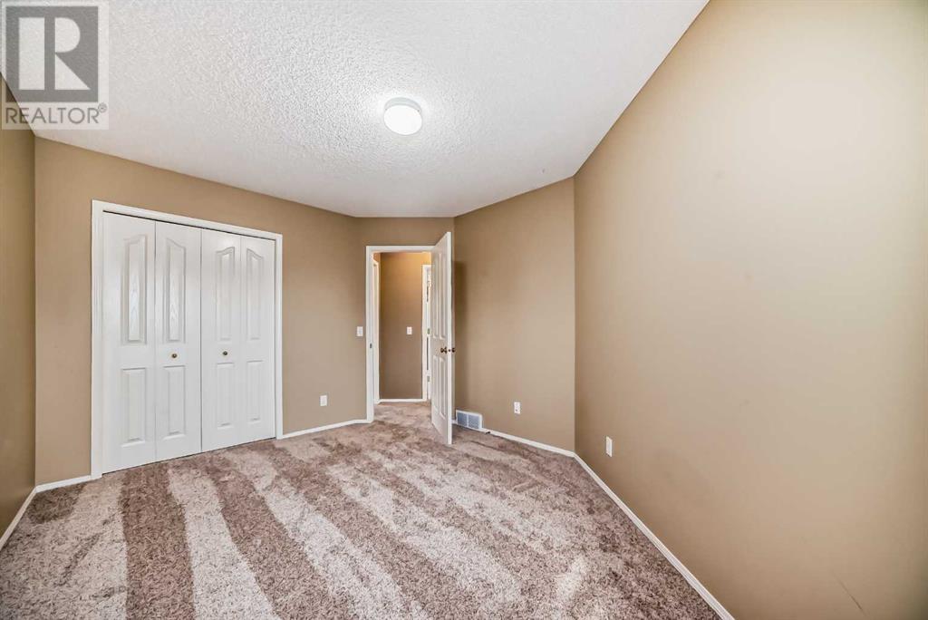 9 Spring Crescent Sw, Calgary, Alberta  T3H 3V1 - Photo 28 - A2165443