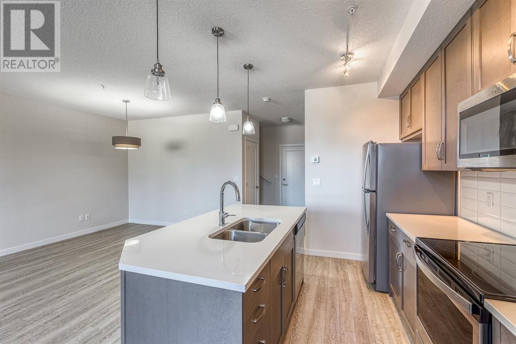 12, 30 Shawnee Common Sw, Calgary, Alberta  T2Y 0R1 - Photo 4 - A2123625