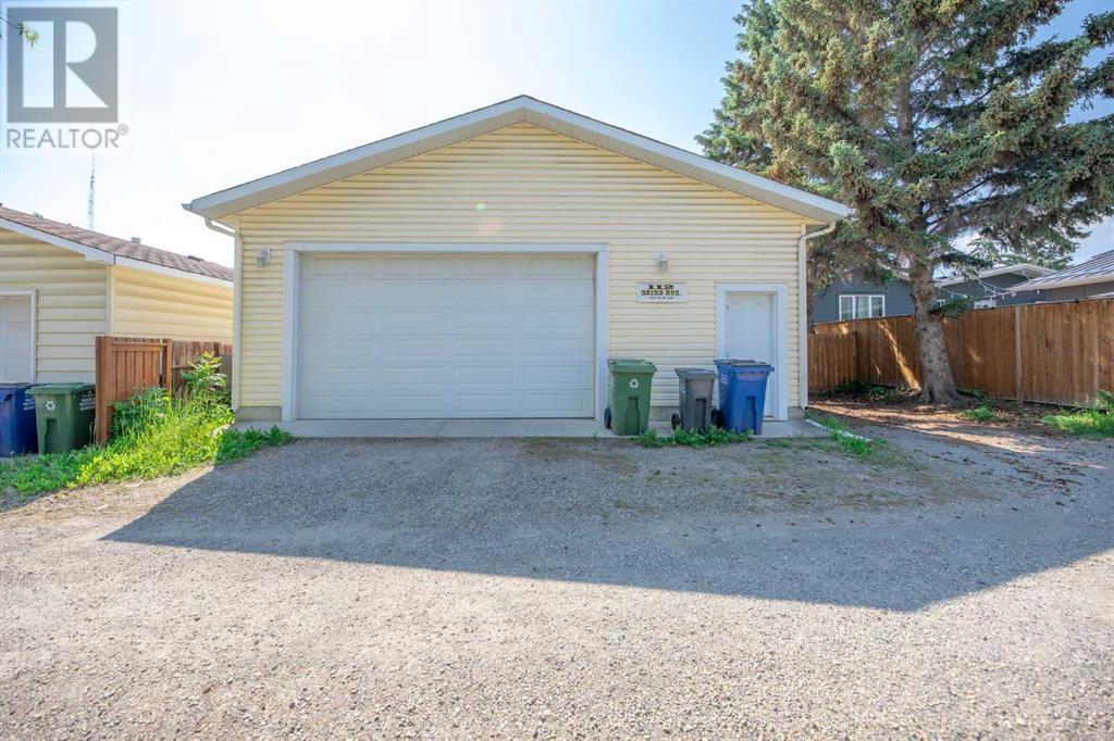 112 Baird Avenue, Cochrane, Alberta  T4C 1C7 - Photo 35 - A2148510