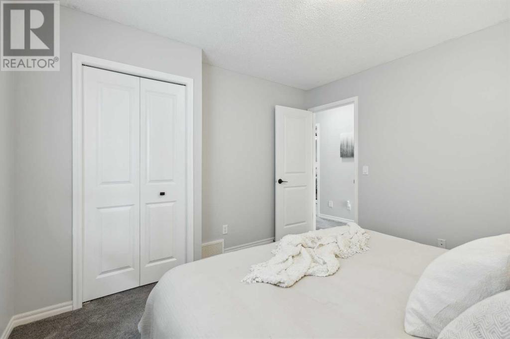 658 Coopers Drive Sw, Airdrie, Alberta  T4B 2R6 - Photo 26 - A2162303