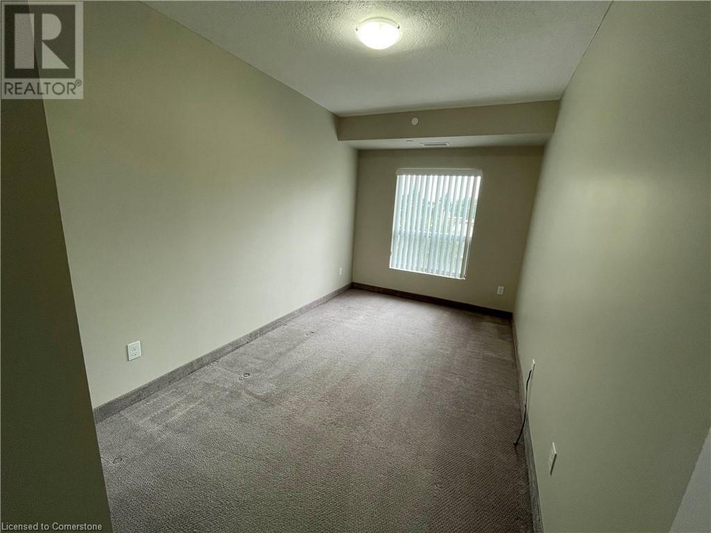 239 Auburn Drive Unit# 818, Waterloo, Ontario  N2K 0B7 - Photo 2 - 40652812