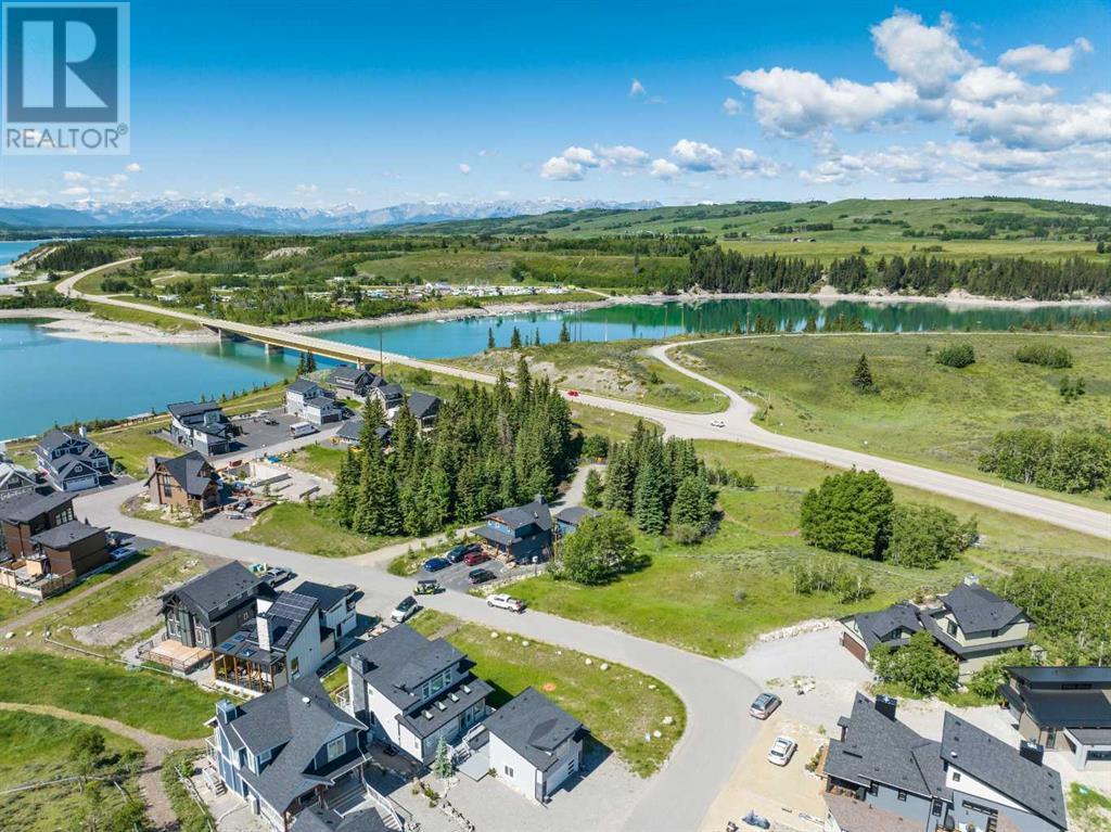 423 Cottageclub Cove, Rural Rocky View County, Alberta  T4C 1B1 - Photo 6 - A2166083