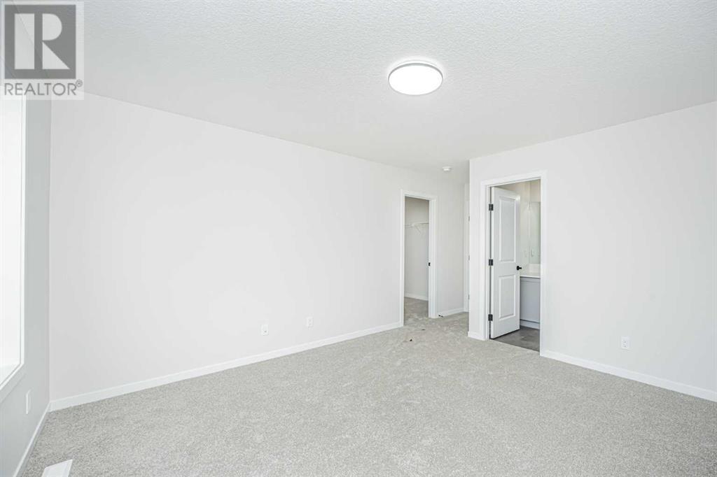 954 Bayview Rise Sw, Airdrie, Alberta  T4B 5K3 - Photo 32 - A2168799