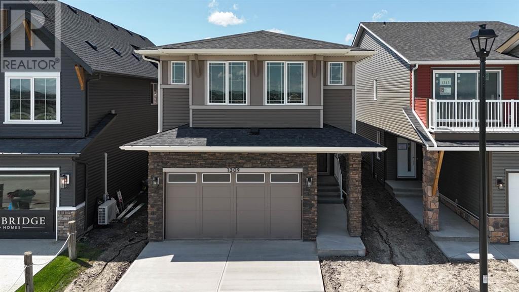 1309 Bayview Point Sw, Airdrie, Alberta  T4B 5K2 - Photo 1 - A2171876