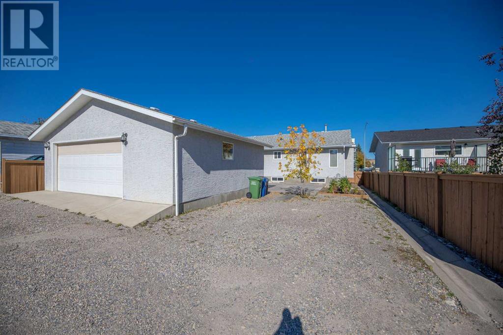 71 Quigley Drive, Cochrane, Alberta  T4C 1P9 - Photo 43 - A2171903