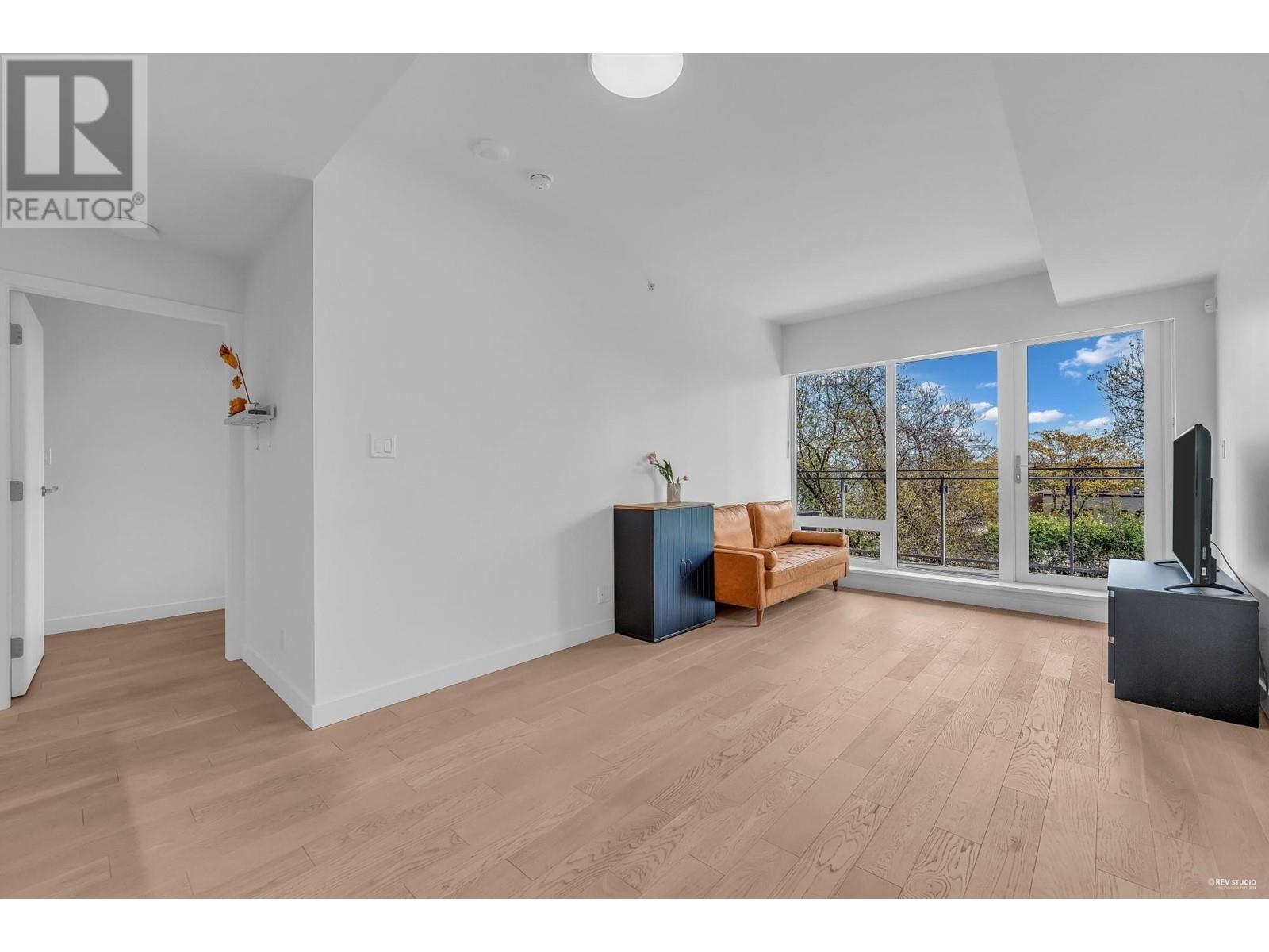 Property at 305 6833 PEARSON WAY image 2