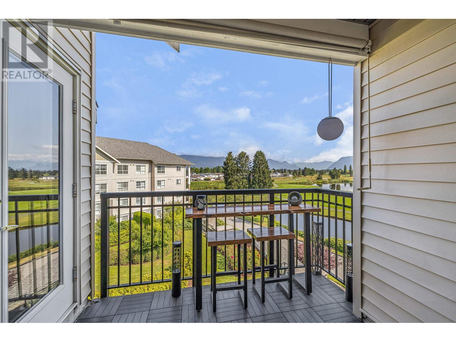 429 19677 Meadow Gardens Way, Pitt Meadows, British Columbia  V3Y 0A2 - Photo 2 - R2910325