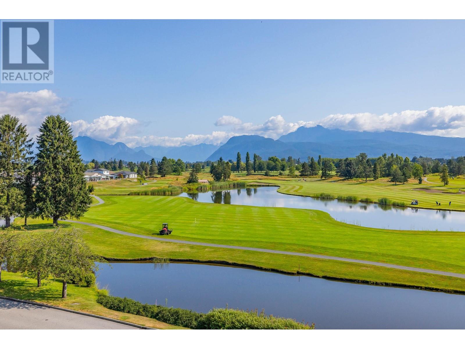 429 19677 Meadow Gardens Way, Pitt Meadows, British Columbia  V3Y 0A2 - Photo 3 - R2910325