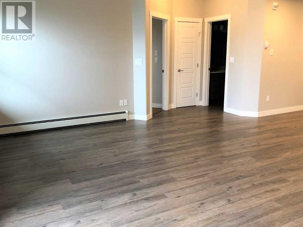 205, 499 Meadow Lake Court E, Brooks, Alberta T1R 0Y7 - Photo 4 - A2175160