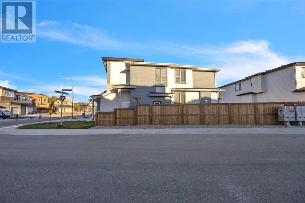 1 Rock Lake Point Nw, Calgary, Alberta  T3G 0E9 - Photo 3 - A2173105