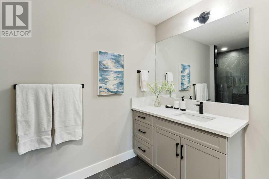 110, 15 Cougar Ridge Landing Sw, Calgary, Alberta  T3H 6H3 - Photo 36 - A2169176