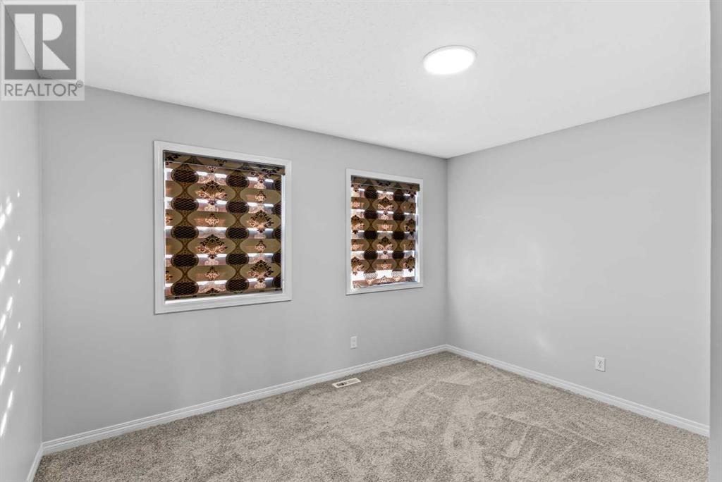 100 Saddlecrest Gardens Ne, Calgary, Alberta  T3J 0C3 - Photo 18 - A2172293